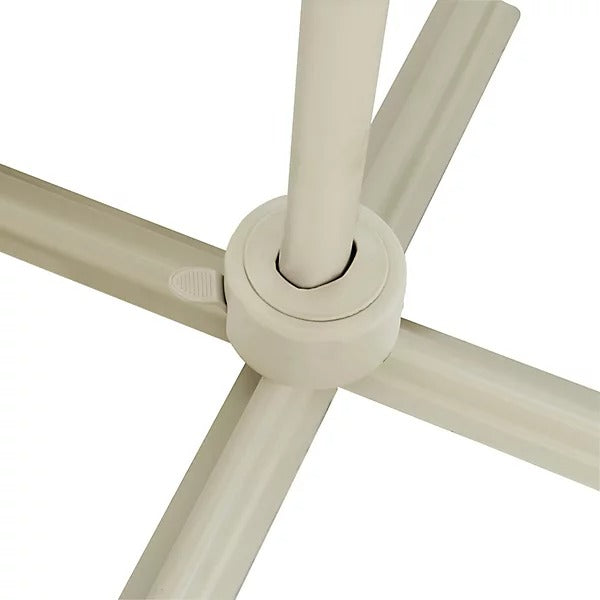 Close-up of a cream patio umbrella base on a white background