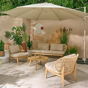 Outdoor patio set with furniture and umbrella in a garden setting